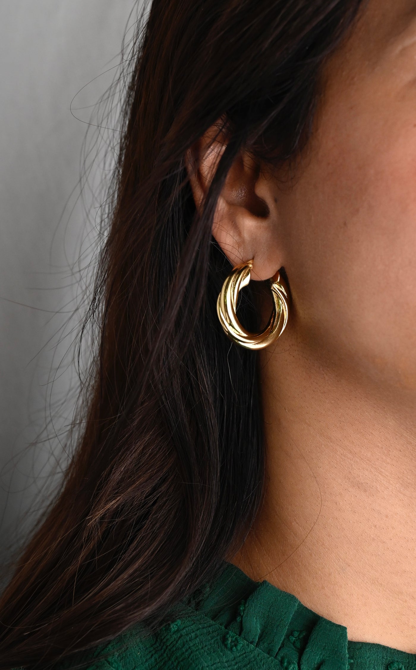 Gold twisted hoops 