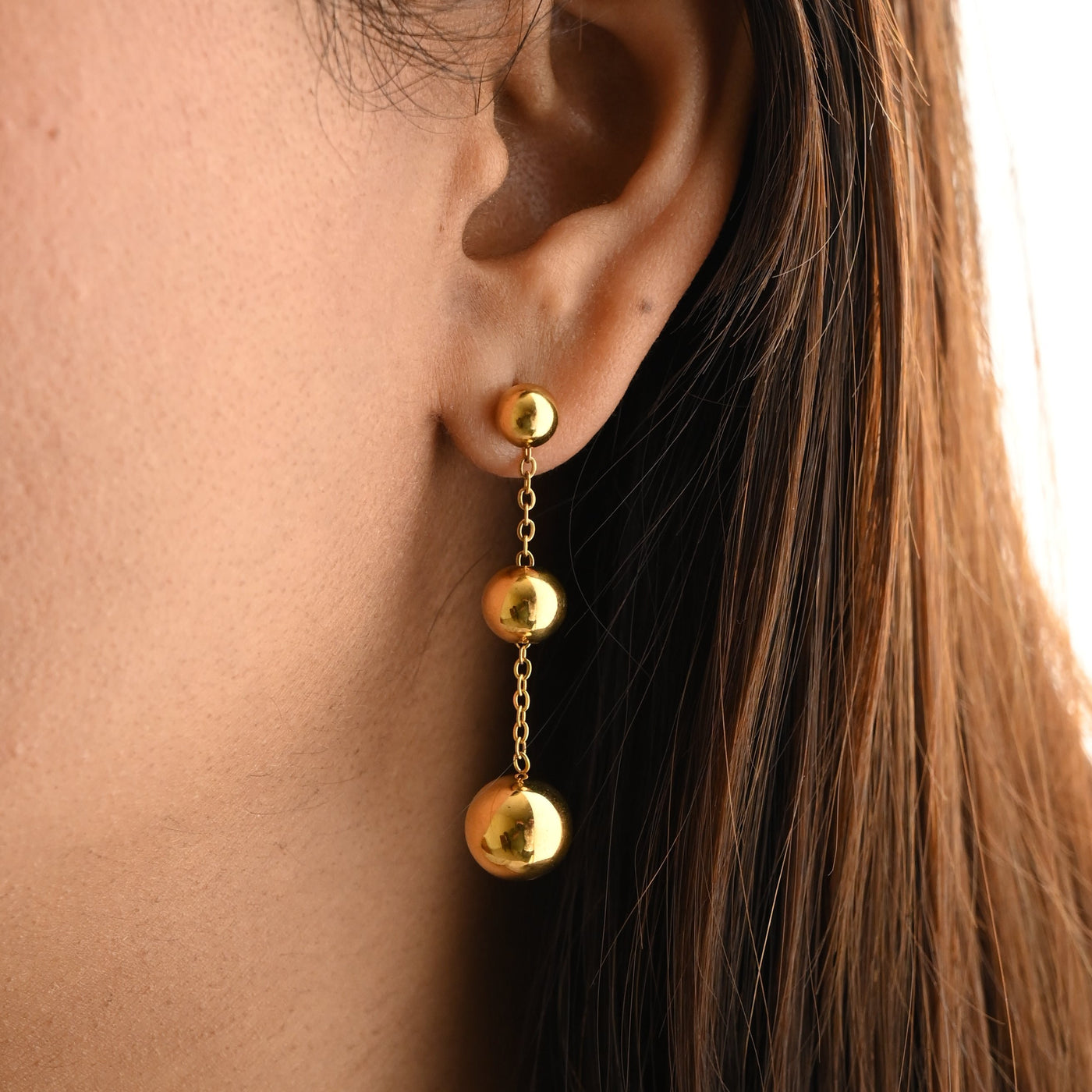 Gold long earrings