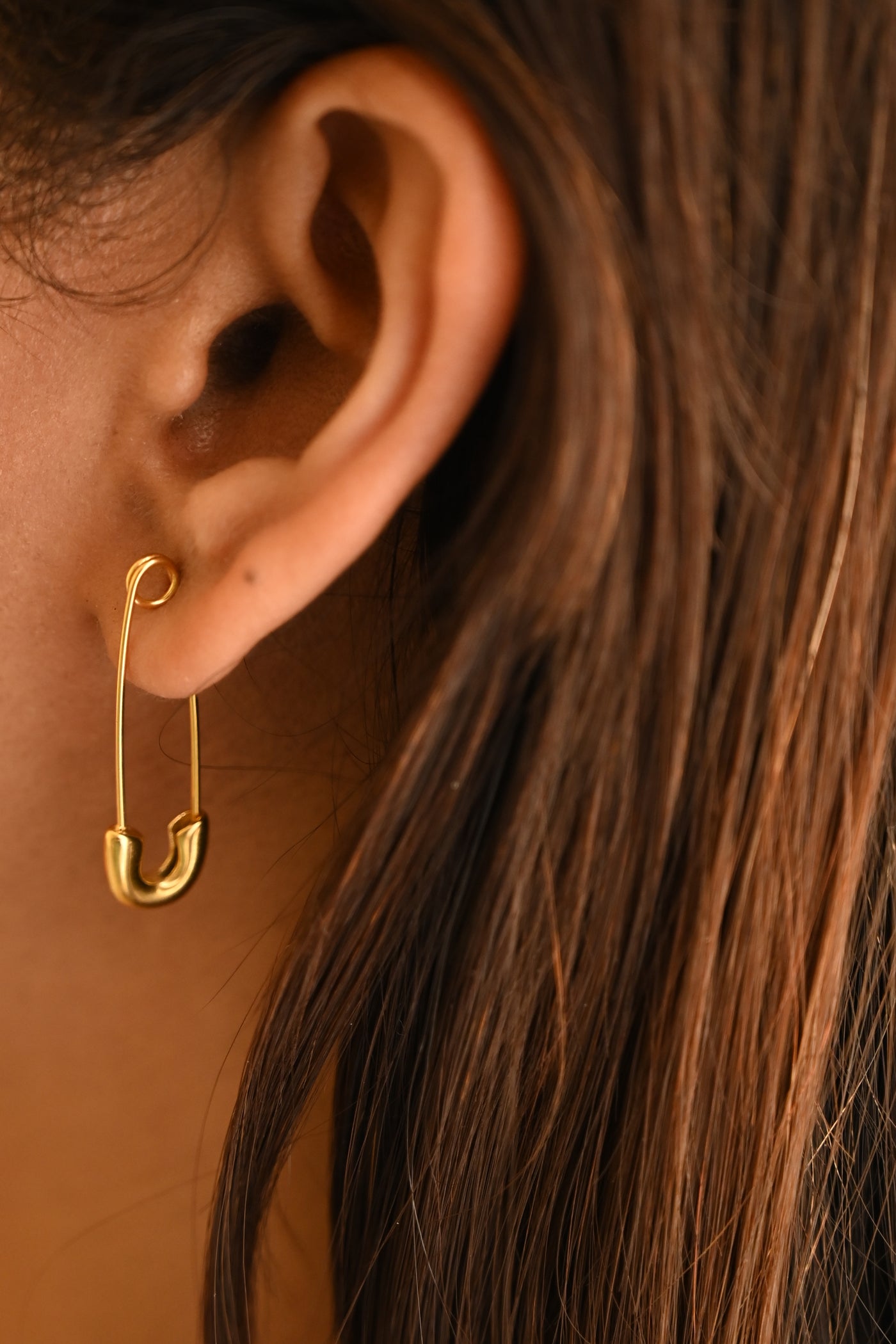 gold safety earrings