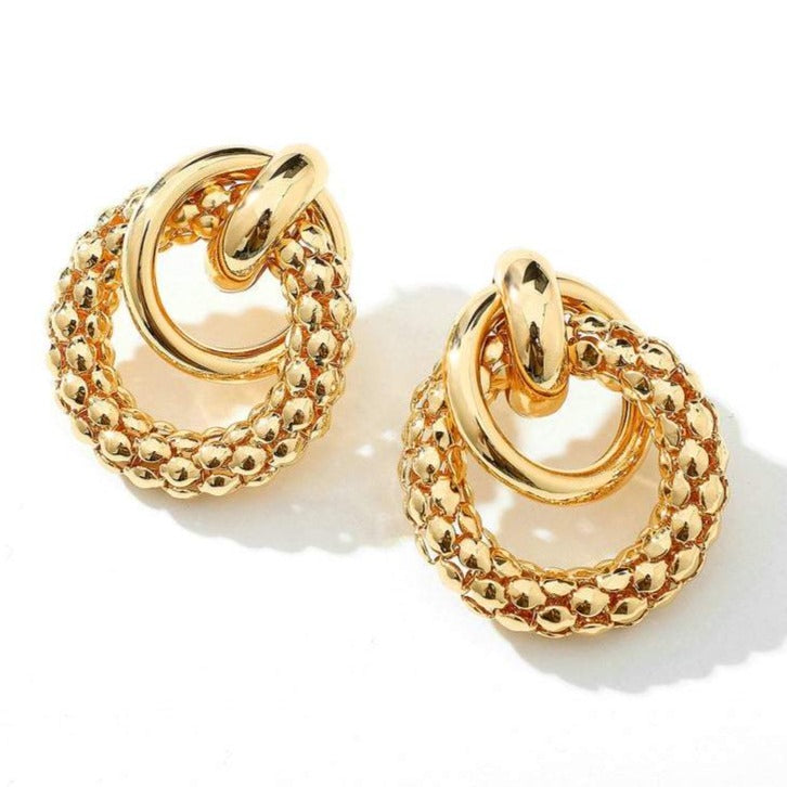 Shop Now Gold Knot Stud Earrings.