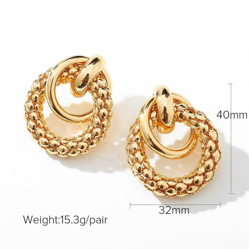 Shop Now Gold Knot Stud Earrings.