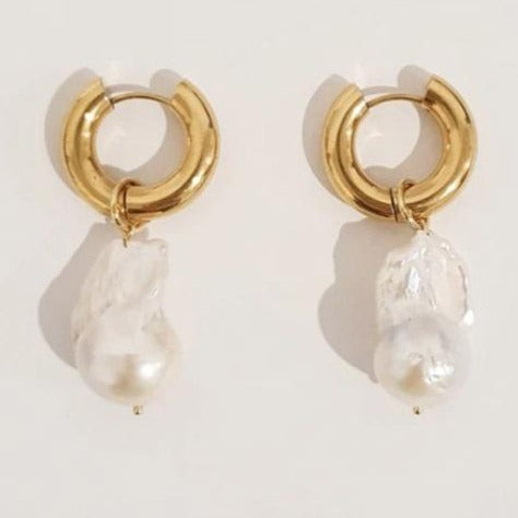Shop Online Baroque Pearl Huggie Earrings.